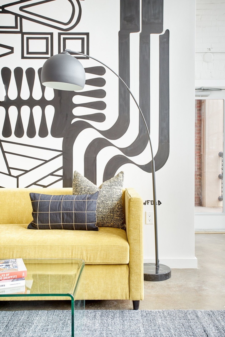 Modern living room with yellow couch